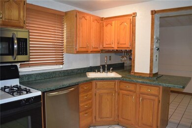 Kitchen with all appliances dishwasher, gas stove,