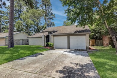 This photo shows a charming single-story home with