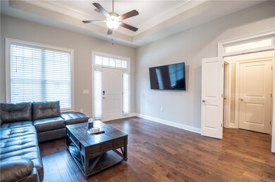 living room, front door and hallway to secondary b