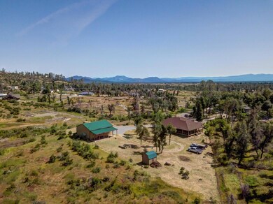 Drone shot back of house and shop lookin