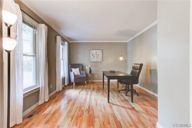 Office with Hardwood , Crown Molding.
