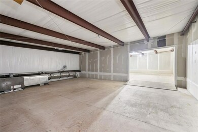 Unit 8 has one office that has a view of Warehouse