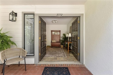 Large foyer with beautiful and durable ceramic slate tile. 8.5x11