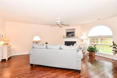 Fireplace features gas logs, and the whole place has a fresh coat of paint.