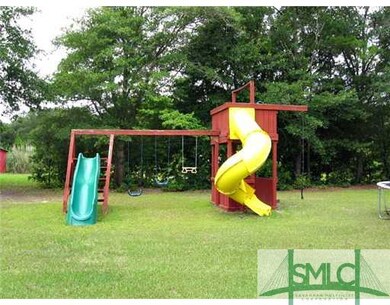 Yard/Garden. This swingset stays !
