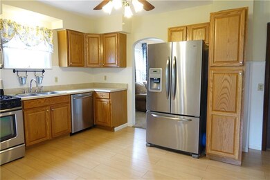 Large Kitchen with abundant cabinetry, newer floor