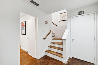 Stairs with concrete flooring