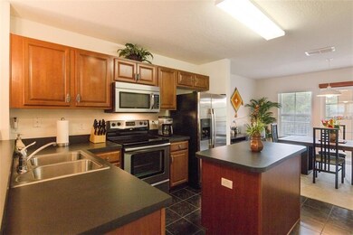neutral colors in spacious kitchen with much appre