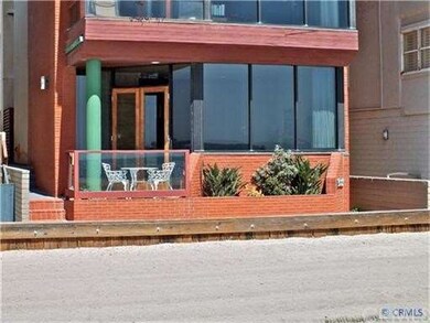 6119 Seaside Walk is the lower unit