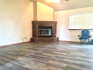 Family Room is open to Kitchen and Dining.   Real 