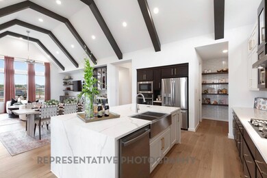 Kitchen with appliances with stainless steel fini
