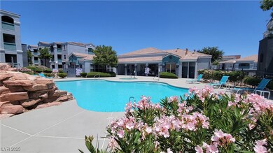 Community pool featuring a patio area