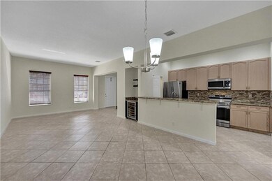 Dining area open to kitchen and living area