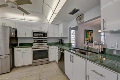 Kitchen with white cabinets, sink, kitchen