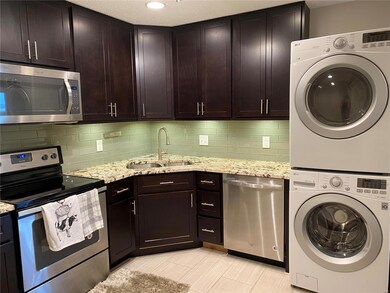 The other side of the kitchen with dishwasher, mag