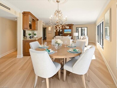 Dining room featuring a chandelier, light hardwood