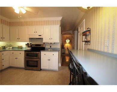 Kitchen. Custom counter adds plenty of space for p