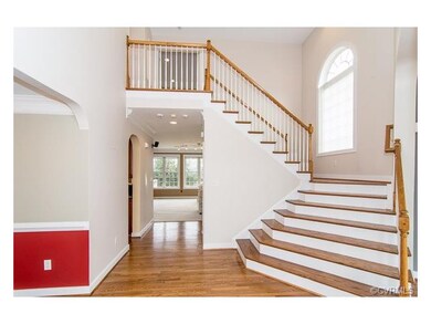 Elegant, hardwood stairwell with a great view of t