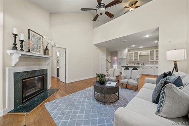 Tall Ceiling with Hardwood Floors Make the Space F