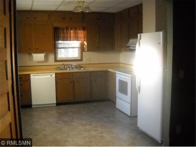 Kitchen recently updated with new flooring and pai
