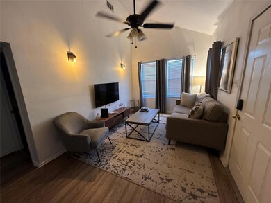 Living room with hardwood / wood-style floors, cei