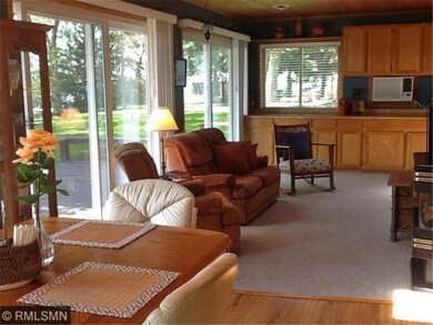 Sunroom has gas fireplace
