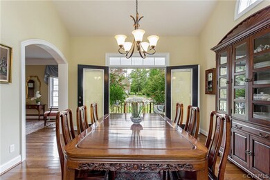 Beautiful spacious dining room with transom window