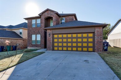 View of front of property featuring a front lawn a