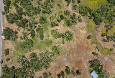 Aerial view of property's location with rural lan