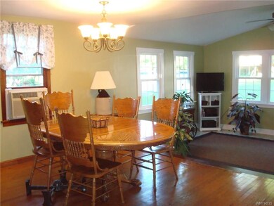 Spacious dining area overlooks family room.