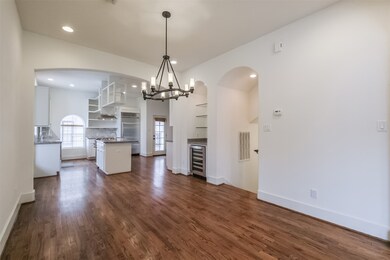 A closer shot of the dining room with dry bar that