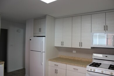 Very bright kitchen with new custom cabinets
