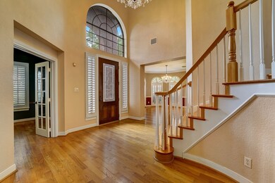 There is a study to the right of the front door and a formal dining on the left upon entering