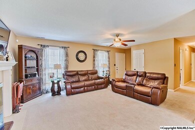 Large Family Room (19x14) has carpet and can accommodate large pieces of furniture while still allowing for plenty of space.