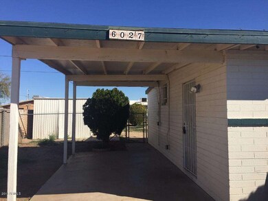 Carport w Sec Door entry into Kitchen
