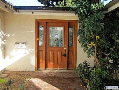 Luxurious beveled glass front door.