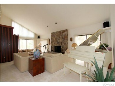 Great Room with Stone Fireplace, Vaulted Ceiling a