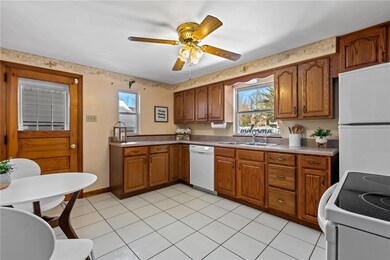 The eat-in-kitchen is open and airy with plenty of
