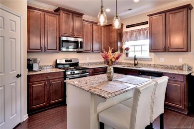 Kitchen with granite countertops, stainless applia