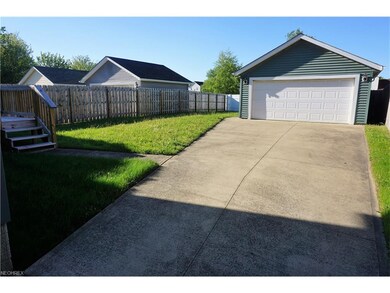Paved Driveway and Large Privacy Fenced Yard with 