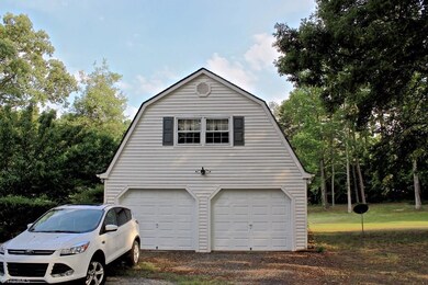 additonal 2 car garage with work shop and upstairs area.