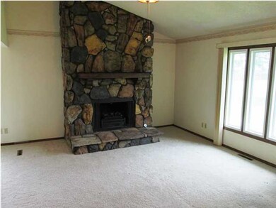 Wood Burning Fireplace In Living Room w/ Vaulted C
