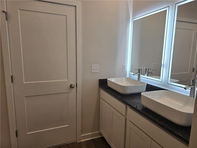 Primay Bathroom on main level, double vanity, LED 