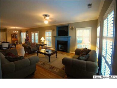Great Room featuring Hardwood Floors, Fireplace as