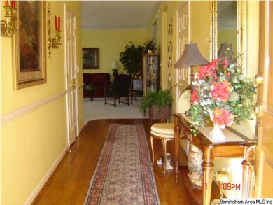 Looking from living room toward front door.