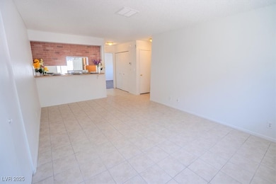 Open Living Room with tile flooring