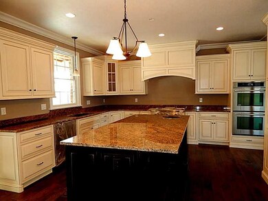 Kitchen. Custom Built Cabinets & granite are now i