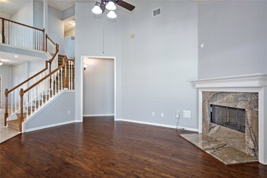 View from backdoor into the Living area & stairs.