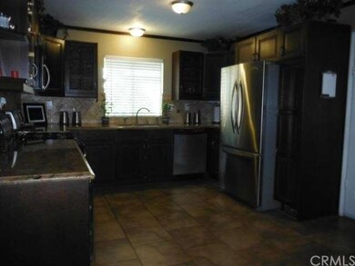 Kitchen to the right as you walk in