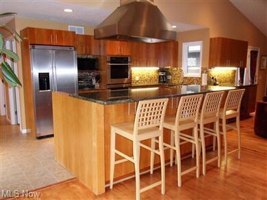 Stainless steel appliances and granite in kitchen!